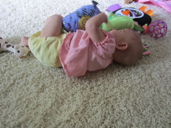 Ginny playing in her comfy cloth diaper