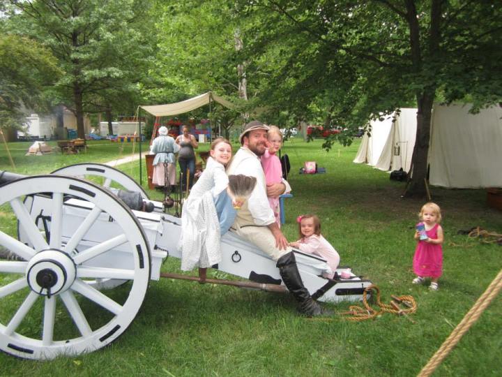 Picture courtesy of Melanie Ruley. I didn't have my camera with me, so I didn't get any pictures of the guys on the field. So here's a romper rom photo of our little Marine girls and Ken Ruley after-hours on the canon carriage.